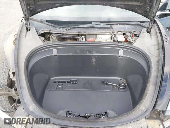 2019 Tesla Model 3 Mid Range with VIN 5YJ3E1EA3KF415601, listed as a IAAI auction lot 42125393 with 150,220 mi miles and . Bid and sale history available at carsss.com. Image 10.