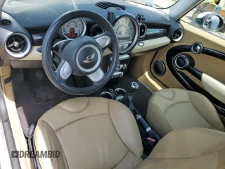 2009 MINI Hardtop z VIN WMWMF33539TU69648, wystawiony jako Copart lot #64213555 z przebiegiem 165 805 mil mil oraz Czysty tytuł • Clean title. Historia ofert i sprzedaży dostępna na DreamBid. Obrazek 9.