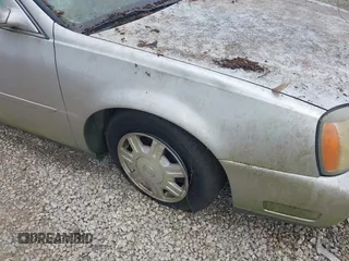 2005 Cadillac DeVille z VIN 1G6KD54Y25U147188, wystawiony jako IAAI lot #42421182 z przebiegiem Nie podano mil oraz . Historia ofert i sprzedaży dostępna na DreamBid. Obrazek 6.