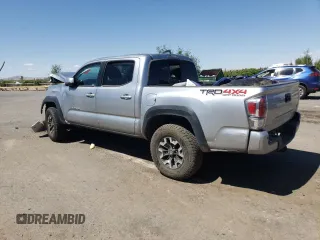 2022 Toyota Tacoma SR with VIN 3TMCZ5AN4NM470997, listed as a Copart auction lot 55165855 with 67,161 mi miles and Salvage title. Bid and sale history available at DreamBid. Image 2.