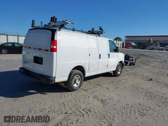 2021 Chevrolet Express Cargo with VIN 1GCWGAFP0M1262410, listed as a IAAI auction lot 42007712 with 61,620 mi miles and . Bid and sale history available at DreamBid. Image 4.