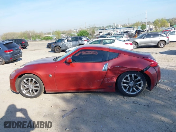 2014 Nissan 370Z Nismo with VIN JN1AZ4EH9EM636340, listed as a IAAI auction lot 42112548 with 143,894 mi miles and . Bid and sale history available at DreamBid. Image 15.
