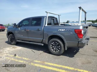 2018 Nissan Titan SV with VIN 1N6AA1E50JN514802, listed as a Copart auction lot 62342875 with 101,593 mi miles and Salvage title. Bid and sale history available at DreamBid. Image 2.
