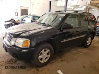 2003 GMC Envoy SLT with VIN 1GKDT13S732208692, listed as a Copart auction lot 67475514 with 243,146 mi miles and Salvage Title. Bid and sale history available at carsss.com. Image 1.