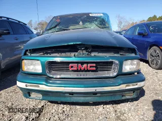 1997 GMC Jimmy SL with VIN 1GKCS13W2V2518446, listed as a Copart auction lot 86629634 with 183,089 mi miles and Salvage Title. Bid and sale history available at carsss.com. Image 5.