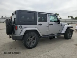 2016 Jeep Wrangler Unlimited Sport z VIN 1C4BJWDG5GL179046, wystawiony jako Copart lot #52989725 z przebiegiem 129 051 mil mil oraz Szkoda całkowita • Salvage title. Historia ofert i sprzedaży dostępna na DreamBid. Obrazek 3.