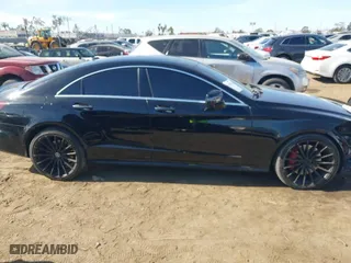 2015 Mercedes-Benz CLS-Class CLS 550 with VIN WDDLJ7DB8FA140210, listed as a IAAI auction lot 41417964 with 106,721 mi miles. Bid and sale history available at carsss.com. Image 14.