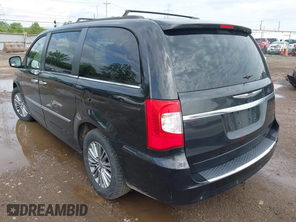 2014 Chrysler Town & Country Touring L with VIN 2C4RC1CG5ER378194, listed as a IAAI auction lot 42176454 with 178,448 mi miles and . Bid and sale history available at carsss.com. Image 3.
