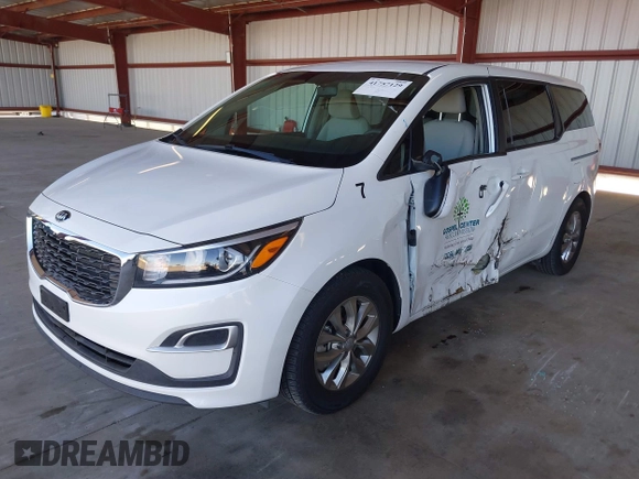 2021 Kia Sedona LX with VIN KNDMB5C15M6669588, listed as a IAAI auction lot 41757129 with 14,738 mi miles. Bid and sale history available at carsss.com. Image 17.