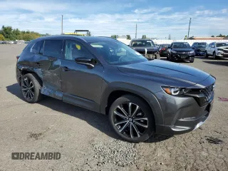 2024 Mazda CX-50 Premium z VIN 7MMVABDY7RN160875, wystawiony jako Copart lot #70931534 z przebiegiem 11 110 mil mil oraz Szkoda całkowita • Salvage title. Historia ofert i sprzedaży dostępna na DreamBid. Obrazek 4.