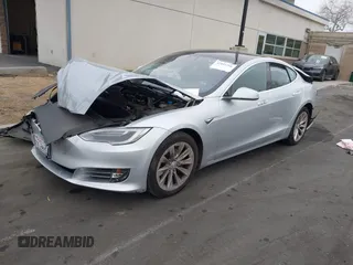 2017 Tesla Model S 60 with VIN 5YJSA1E17HF189627, listed as a IAAI auction lot 41891766 with 106,003 mi miles and . Bid and sale history available at DreamBid. Image 21.