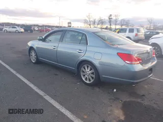 2010 Toyota Avalon XL with VIN 4T1BK3DB1AU363817, listed as a IAAI auction lot 41010053 with 259,106 mi miles and . Bid and sale history available at carsss.com. Image 3.