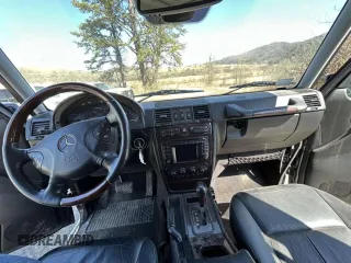 2003 Mercedes-Benz G-Class with VIN WDCYR49E33X141312, listed as a Copart auction lot 50188485 with 146,986 mi miles and Salvage Title. Bid and sale history available at carsss.com. Image 9.