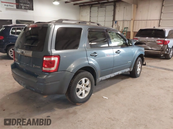 2010 Ford Escape Hybrid with VIN 1FMCU4K31AKC15842, listed as a IAAI auction lot 41332030 with 490,296 mi miles and . Bid and sale history available at DreamBid. Image 4.