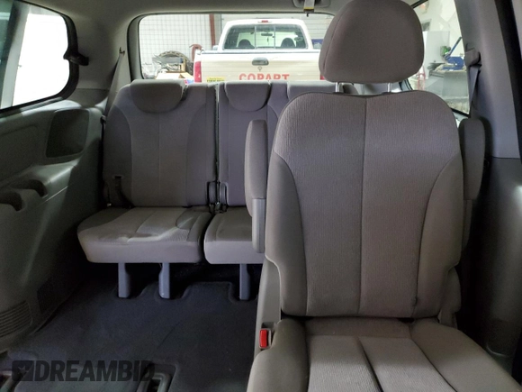2014 Kia Sedona LX with VIN KNDMG4C77E6541368, listed as a Copart auction lot 52749305 with 130,253 mi miles and Salvage Title. Bid and sale history available at carsss.com. Image 10.