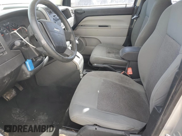 2007 Jeep Compass Sport with VIN 1J8FT47WX7D383699, listed as a Copart auction lot 88482135 with 219,898 mi miles and Salvage Title. Bid and sale history available at carsss.com. Image 7.