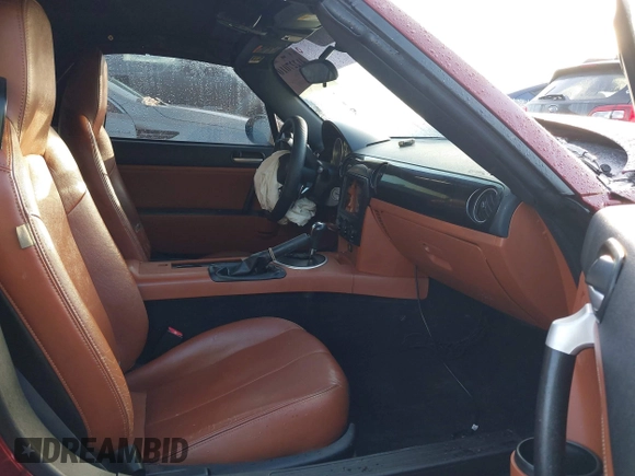 2006 Mazda MX-5 Miata Grand Touring with VIN JM1NC25F260122129, listed as a IAAI auction lot 41227010 with 170,780 mi miles and . Bid and sale history available at DreamBid. Image 5.
