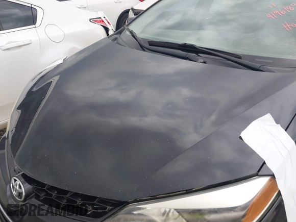 2014 Toyota Corolla L with VIN 5YFBURHE3EP175860, listed as a IAAI auction lot 41961890 with 141,701 mi miles and . Bid and sale history available at DreamBid. Image 18.