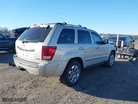2010 Jeep Grand Cherokee Limited with VIN 1J4RR5GT9AC135837, listed as a IAAI auction lot 41617104 with 75,757 mi miles. Bid and sale history available at carsss.com. Image 4.