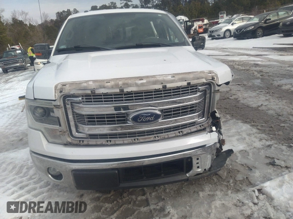 2014 Ford F-150 XL with VIN 1FTFW1CT3EKG17778, listed as a IAAI auction lot 41362619 with 122,963 mi miles. Bid and sale history available at carsss.com. Image 11.