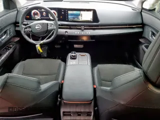 2024 Nissan ARIYA Evolve+ with VIN JN1DF0BB1RM738901, listed as a Copart auction lot 55597295 with 6,569 mi miles and Salvage title. Bid and sale history available at DreamBid. Image 8.