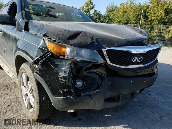 2012 Kia Sorento EX with VIN 5XYKUCA66CG305700, listed as a Copart auction lot 75242524 with 0 mi miles and Salvage Title. Bid and sale history available at carsss.com. Image 12.