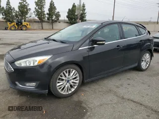 2015 Ford Focus Titanium с VIN 1FADP3N25FL324390, выставлен на аукционе Copart как лот 59801805 с пробегом 97 615 миль миль и Списание • Salvage title. История ставок и продаж доступна на DreamBid. Изображение 1.