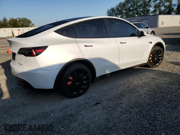 2022 Tesla Model Y Long Range with VIN 7SAYGAEE7NF376795, listed as a Copart auction lot 55113135 with 66,796 mi miles and Salvage Title. Bid and sale history available at carsss.com. Image 3.