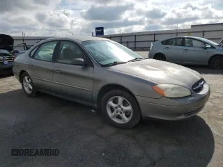 2001 Ford Taurus LX with VIN 1FAFP52U01A131563, listed as a Copart auction lot 89201965 with 79,048 mi miles and Salvage title. Bid and sale history available at DreamBid. Image 4.