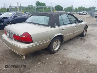 1999 Mercury Grand Marquis LS с VIN 2MEFM75W6XX630636, выставлен на аукционе IAAI как лот 42471128 с пробегом 216 223 миль миль и . История ставок и продаж доступна на DreamBid. Изображение 4.
