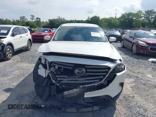 2022 Mazda CX-9 Touring with VIN JM3TCBCY4N0604912, listed as a IAAI auction lot 42456794 with 49,853 mi miles and . Bid and sale history available at DreamBid. Image 12.