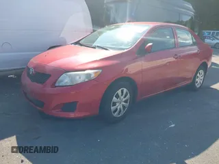 2010 Toyota Corolla with VIN 2T1BU4EE6AC296559, listed as a IAAI auction lot 40132161 with 213,714 mi miles. Bid and sale history available at carsss.com. Image 2.