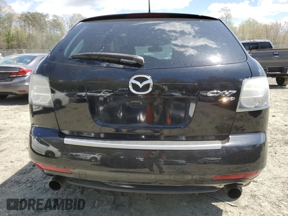 2010 Mazda CX-7 Grand Touring z VIN JM3ER4WL1A0324068, wystawiony jako Copart lot #53095905 z przebiegiem 137 507 mil mil oraz Szkoda całkowita • Salvage title. Historia ofert i sprzedaży dostępna na DreamBid. Obrazek 6.