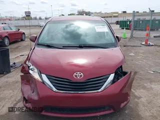 2014 Toyota Sienna LE AAS with VIN 5TDKK3DC4ES462090, listed as a IAAI auction lot 41942354 with 215,814 mi miles. Bid and sale history available at carsss.com. Image 12.