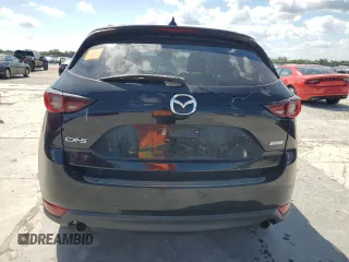 2018 Mazda CX-5 Touring with VIN JM3KFACM0J1408075, listed as a Copart auction lot 50866735 with Not Provided miles and Salvage Title. Bid and sale history available at carsss.com. Image 6.