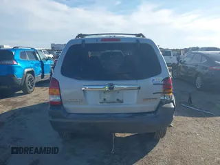 2003 Mazda Tribute LX with VIN 4F2YZ04183KM44733, listed as a IAAI auction lot 41472662 with 246,522 mi miles and . Bid and sale history available at DreamBid. Image 16.