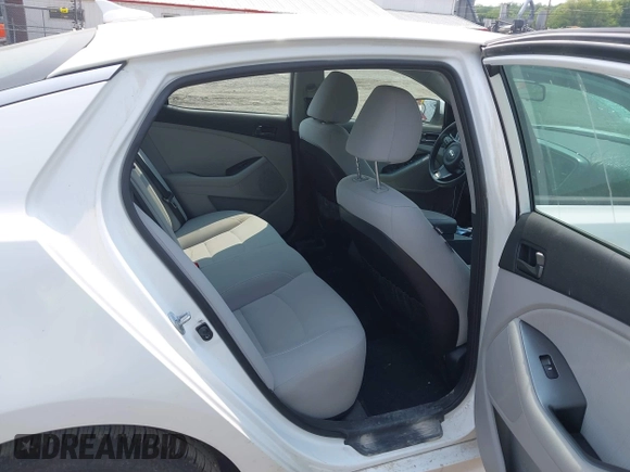 2015 Kia Optima LX with VIN 5XXGM4A71FG356034, listed as a IAAI auction lot 42402142 with 131,376 mi miles and . Bid and sale history available at DreamBid. Image 8.