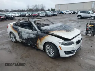 2016 BMW 2 Series 228i xDrive with VIN WBA1L9C56GV325558, listed as a IAAI auction lot 41833671 with 1 mi miles. Bid and sale history available at carsss.com. Image 1.