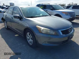 2009 Honda Accord LX-P with VIN JHMCP26459C007437, listed as a IAAI auction lot 41896268 with 221,522 mi miles and . Bid and sale history available at DreamBid. Image 1.