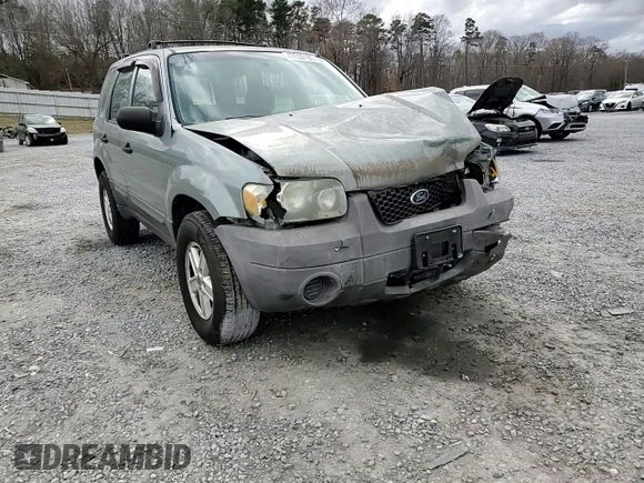 2005 Ford Escape XLS Value z VIN 1FMYU92Z05KA21168, wystawiony jako Copart lot #47630185 z przebiegiem 253 389 mil mil oraz Szkoda całkowita • Salvage title. Historia ofert i sprzedaży dostępna na DreamBid. Obrazek 11.