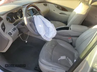 2012 Buick LaCrosse Touring с VIN 1G4GJ5E35CF131532, выставлен на аукционе Copart как лот 81626724 с пробегом 163 571 миль миль и Списание • Salvage title. История ставок и продаж доступна на DreamBid. Изображение 7.
