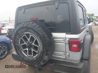 2024 Jeep Wrangler Rubicon with VIN 1C4PJXFG7RW252959, listed as a IAAI auction lot 41955302 with 27,727 mi miles and . Bid and sale history available at DreamBid. Image 16.