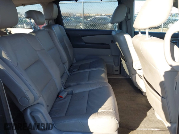 2014 Honda Odyssey EX-L with VIN 5FNRL5H61EB079739, listed as a IAAI auction lot 41659048 with 137,012 mi miles and . Bid and sale history available at carsss.com. Image 8.