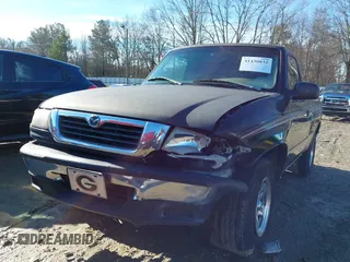 1998 Mazda B-Series 2WD Truck SX with VIN 4F4YR12C4WTM47743, listed as a IAAI auction lot 41430832 with 318,909 mi miles. Bid and sale history available at carsss.com. Image 6.