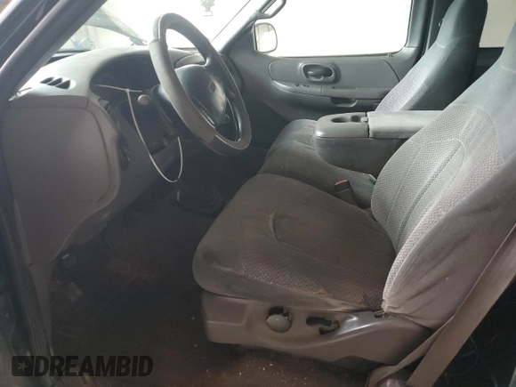 1999 Ford F-150 with VIN 1FTZX1723XNA24144, listed as a Copart auction lot 58071155 with 320,829 mi miles and Salvage title. Bid and sale history available at DreamBid. Image 7.