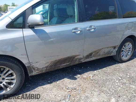 2011 Toyota Sienna XLE AAS with VIN 5TDYK3DC3BS083443, listed as a IAAI auction lot 42015856 with 138,045 mi miles and . Bid and sale history available at DreamBid. Image 6.