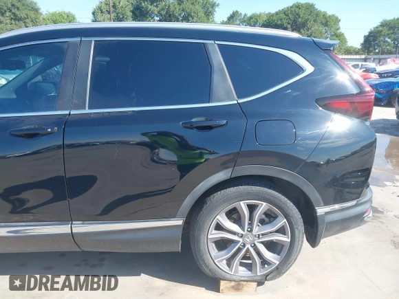 2020 Honda CR-V Touring z VIN 7FART6H91LE005707, wystawiony jako IAAI lot #42326337 z przebiegiem 40 555 mil mil oraz . Historia ofert i sprzedaży dostępna na DreamBid. Obrazek 20.