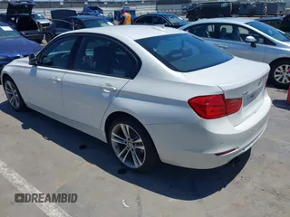 2013 BMW 3 Series 328i xDrive with VIN WBA3B3C56DJ698238, listed as a IAAI auction lot 42333709 with 82,167 mi miles and . Bid and sale history available at DreamBid. Image 3.