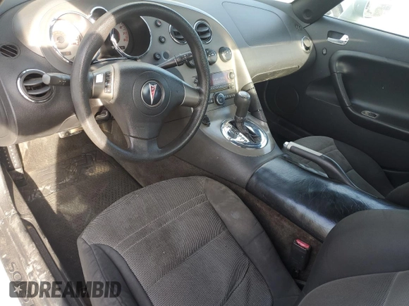 2008 Pontiac Solstice z VIN 1G2MC35B18Y124560, wystawiony jako Copart lot #49916045 z przebiegiem 176 918 mil mil oraz Szkoda całkowita • Salvage title. Historia ofert i sprzedaży dostępna na DreamBid. Obrazek 8.