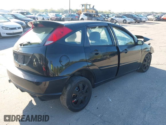 2007 Ford Focus S with VIN 1FAFP37N77W223156, listed as a IAAI auction lot 41785794 with Not Provided miles and . Bid and sale history available at carsss.com. Image 4.